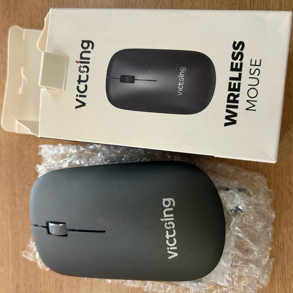 Black Wireless Mouse with Symmetrical Design